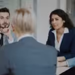 Business people in a meeting around a table
