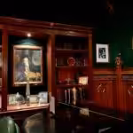 black wooden grand piano inside room