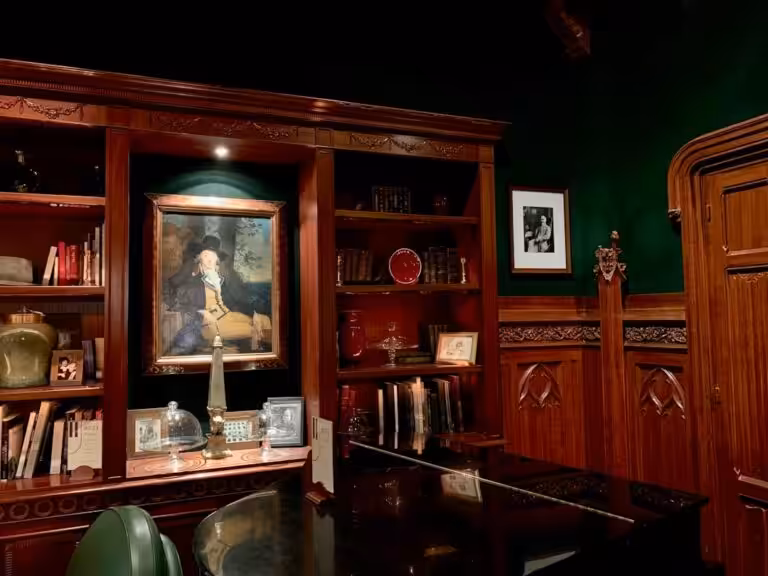 black wooden grand piano inside room