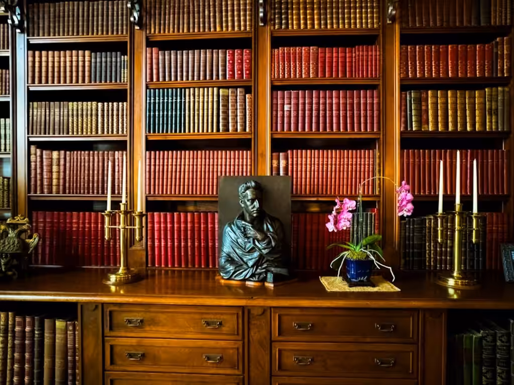 A desk with a picture of a man on it
