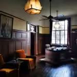 brown wooden table near brown sofa chair